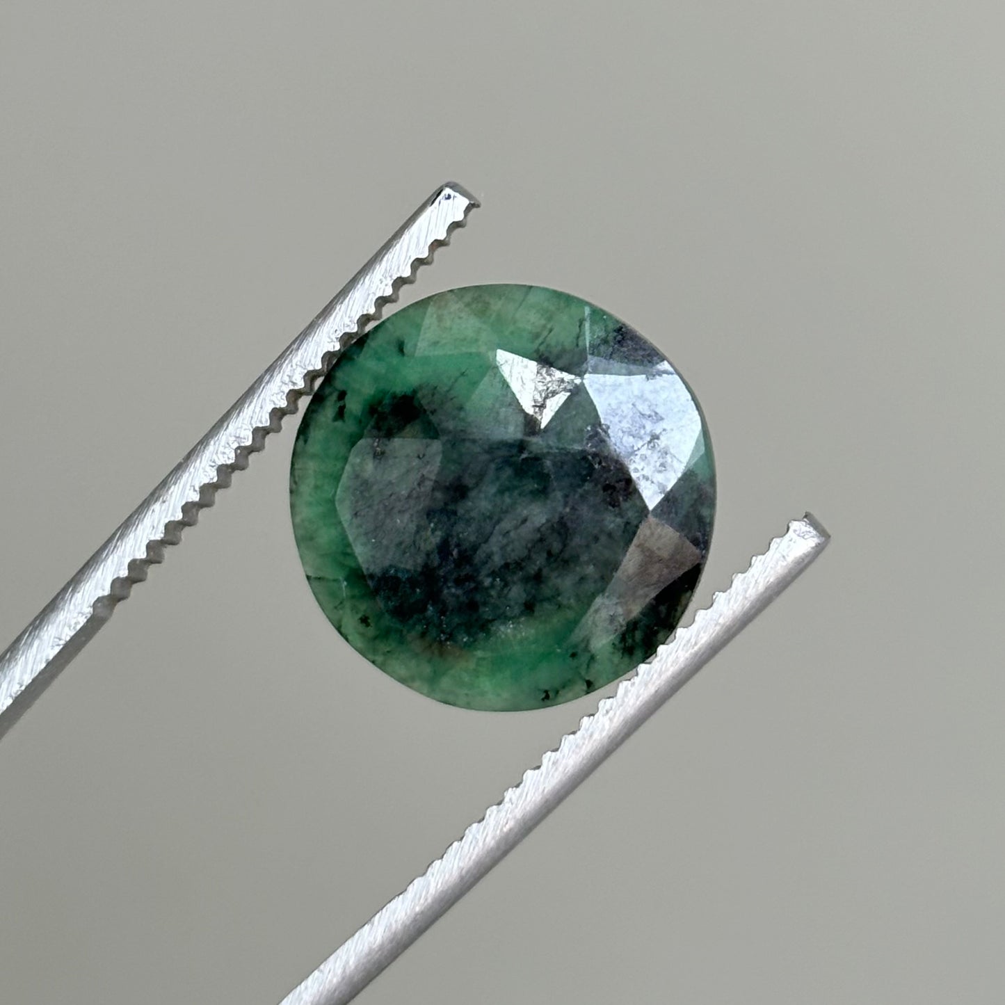 emerald faceted cabochon